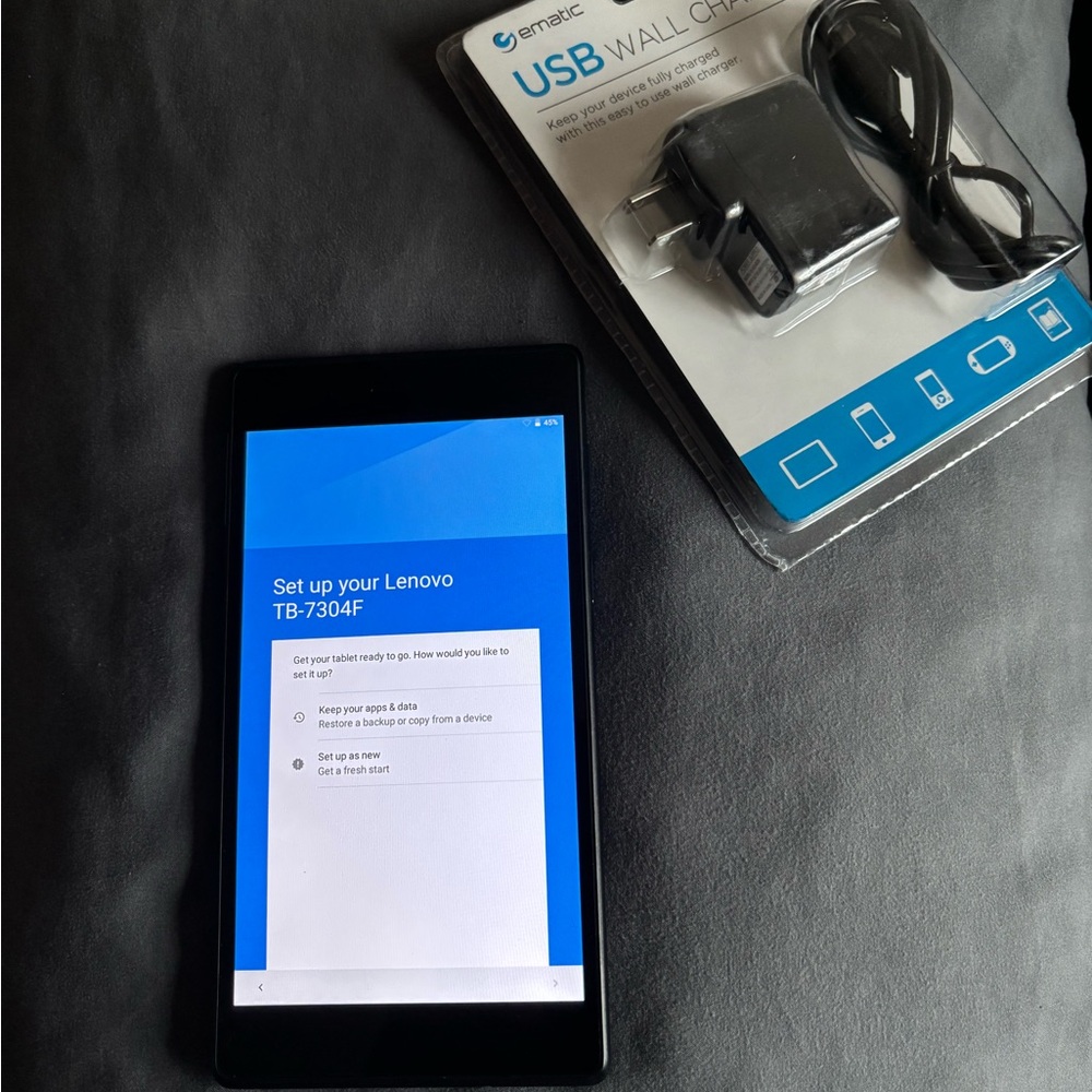 Lenovo “ Tab 7” tablet. Includes brand new charger in box.